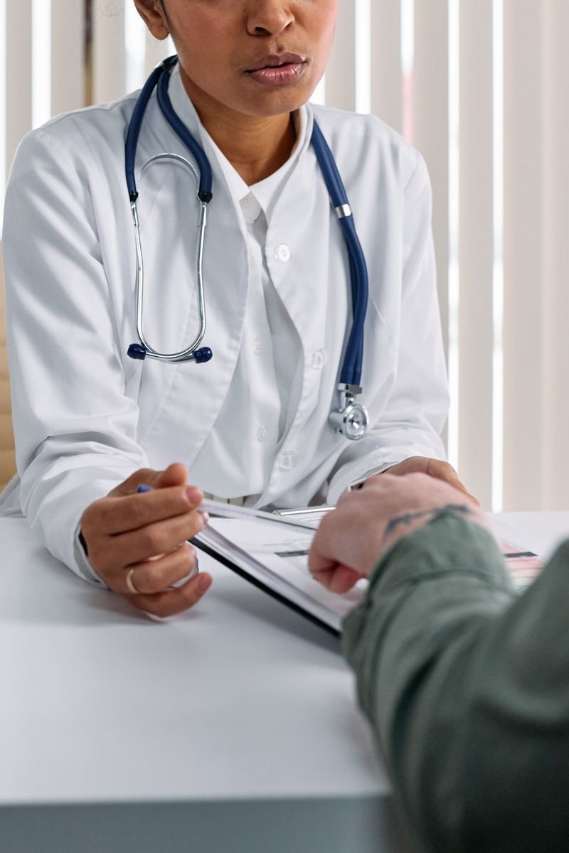 A doctor reviewing coverage details with a patient